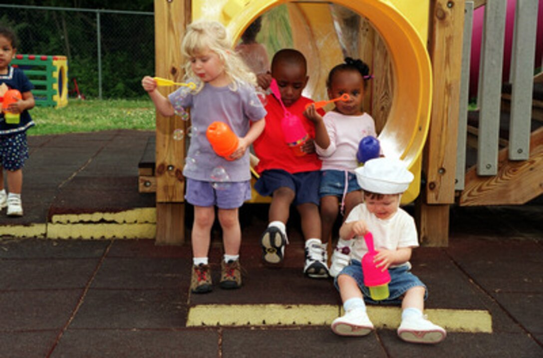 Military dependent children at this Child Development Center at Fort Belvoir, Va., and others like it at bases throughout the world enjoy some of the most affordable and high-quality child care in the country according to the National Women's Law Center. Secretary of Defense William S. Cohen was presented a copy of the study entitled "Be All That We Can Be: Lessons from the Military for Improving Our Nation's Child Care System" by Nancy Campbell, co-director of the center, in a Pentagon press briefing on May 16, 2000. The Center cited the military in their report as an "...excellent model for the very real reforms that need to be made in civilian child care policy and practice as well." 