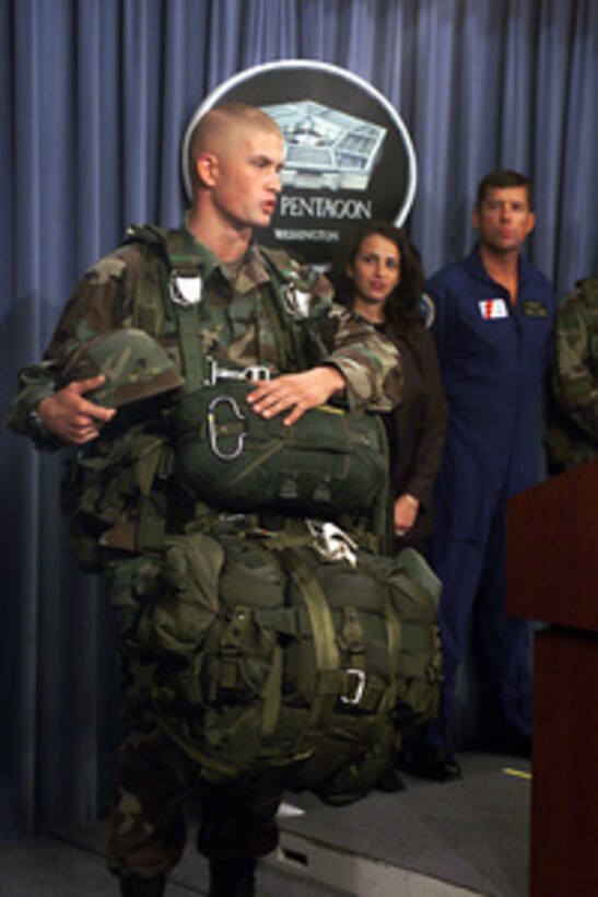 Army Spc. Shawn Broe, of the 82nd Airborne Division, tells reporters at a Pentagon news briefing on May 18, 2000, what is in store for one of the winners of the Military Fantasy Career Contest. The Department of Defense, in cooperation with Yahoo! Inc., today launched an awareness initiative that will allow Internet users the opportunity to experience a "day in the life " of either a soldier, sailor, airman, Marine or Coast Guardsman. The initiative is designed to showcase some of the adventurous and challenging careers available in today's military. 