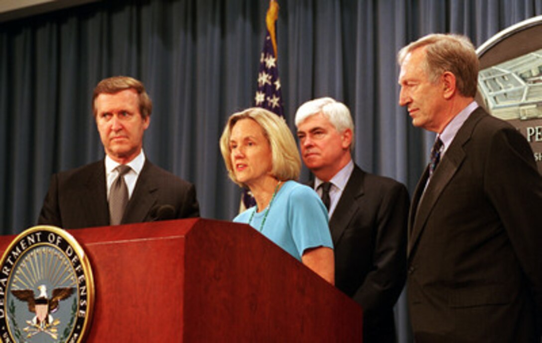 Nancy Duff Campbell (center), co-director of the National Women's Law Center, answers a reporter's question about the findings from the center's study entitled "Be All That We Can Be: Lessons from the Military for Improving Our Nation's Child Care System" at a May 16, 2000, Pentagon press conference. Joining her in the press conference are (L to R): Secretary of Defense William S. Cohen, Sen. Christopher Dodd (D-Conn.) and Sen. Jim Jeffords (R-Vt.). The Center cited the military in their report as an "...excellent model for the very real reforms that need to be made in civilian child care policy and practice as well." 