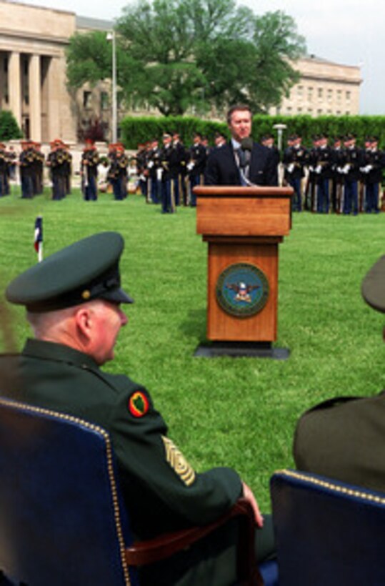 Secretary of Defense William S. Cohen delivers the keynote address during the 50th Anniversary of Armed Forces Day ceremony at the Pentagon on May 18, 2000. Cohen and Chairman of the Joint Chiefs of Staff Gen. Henry H. Shelton, U.S. Army, co-hosted the event which honored approximately 300 "unsung heroes" who are military and civilian employees of the Department of Defense in the National Capital region. 