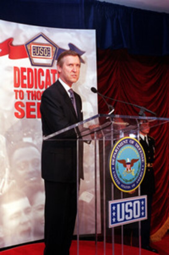 Secretary of Defense William S. Cohen addresses the audience at a ceremony marking the opening of the United Service Organizations Corridor in the Pentagon on Nov. 2, 2000. The display commemorates the close relationship between the Department of Defense and the USO. 