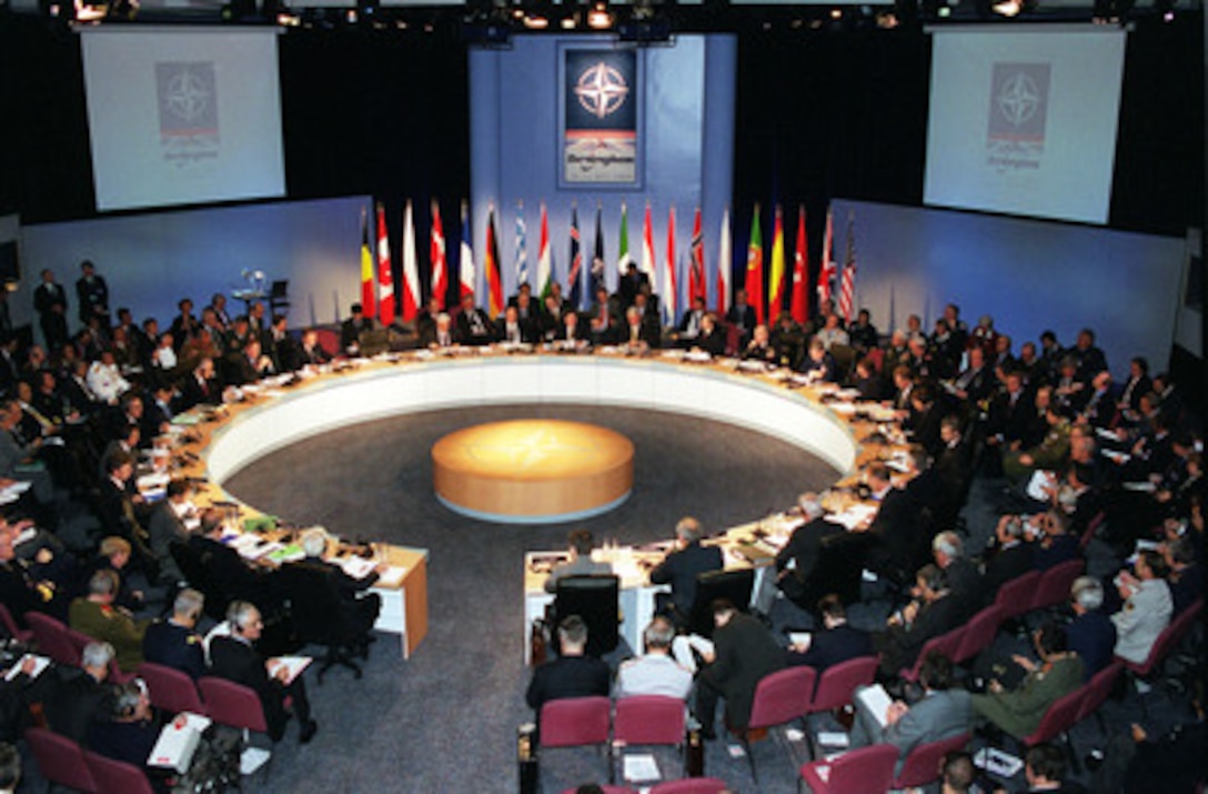 The annual Informal Meeting of NATO Defense Ministers comes to order at the International Conference Center in Birmingham, England, on Oct. 10, 2000. Each Autumn a different member of the 19-nation security alliance hosts the informal meeting in which a range of security issues are freely discussed, but no binding decisions are made. All binding agreements are left to the biannual defense ministerial held at NATO Headquarters in Brussels, Belgium. 