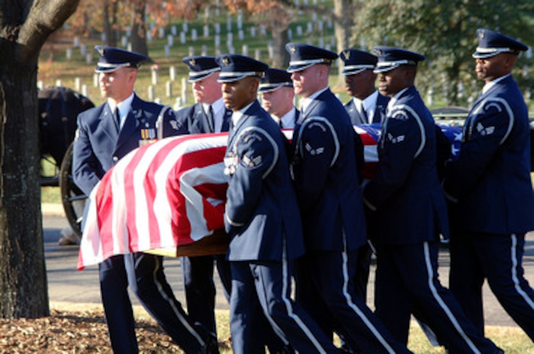 Members of the U.S. Air Force Honor Guard carry the casket of U.S. Air Force Medal of Honor recipient John L. Levitow to his grave in Arlington National Cemetery where he will be buried with full military honors on Nov. 17, 2000. Levitow earned the medal as an airman 1st class serving as loadmaster aboard a severely damaged AC-47 gunship flying a mission over Long Binh, South Vietnam, on Feb. 24, 1969. A C-17 Globemaster III was named "The Spirit of John L. Levitow," in his honor Jan. 23, 1998. Levitow died at his home in Connecticut on Nov. 8, 2000, after a lengthy battle with cancer. 