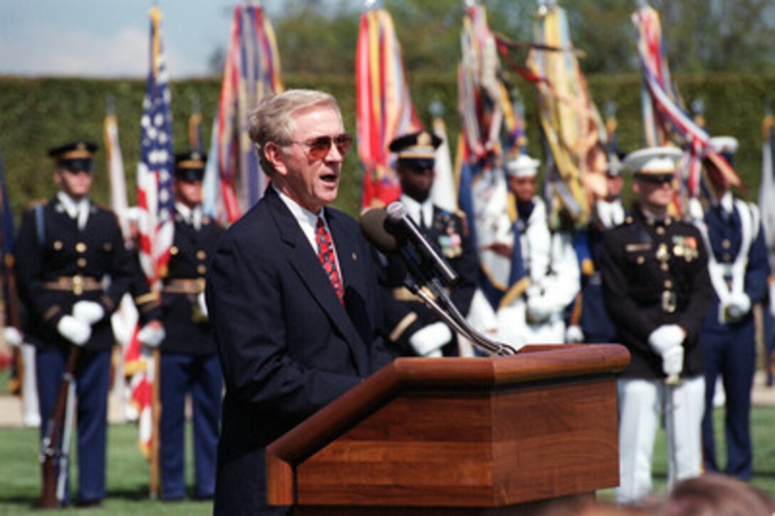 Retired Air Force Lt. Col. Richard E. Smith Jr. addresses the audience as the keynote speaker at the National POW/MIA Recognition Day ceremonies held at the Pentagon, on Sept. 15, 2000. Smith, who flew F-105D fighter-bombers out of Takli Air Force Base, Thailand, during the Vietnam War, was shot down over North Vietnam in October 1967 and served 5 1/2 years as a prisoner of war. 