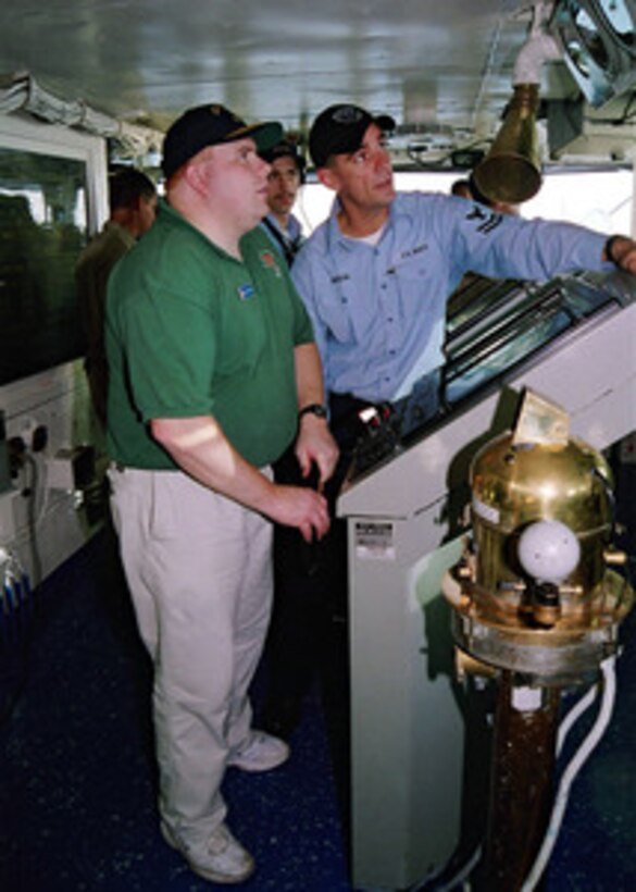 Joseph Blondo (left) from Budd Lake, N.J., recently won his dream job of working on a United States Navy aircraft carrier. Blondo won a contest sponsored by the military in conjunction with the internet company Yahoo! and was flown to USS Enterprise (CVN 65) on Sept. 21, 2000. Enterprise is currently underway in the Atlantic Ocean. 