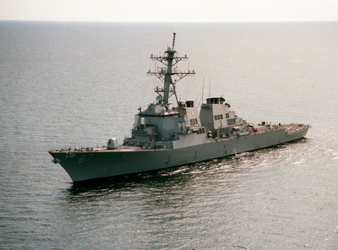 USS Cole (DDG 67) underway in the Persian Gulf in support of the Southwest Asia build-up in March 1998. 
