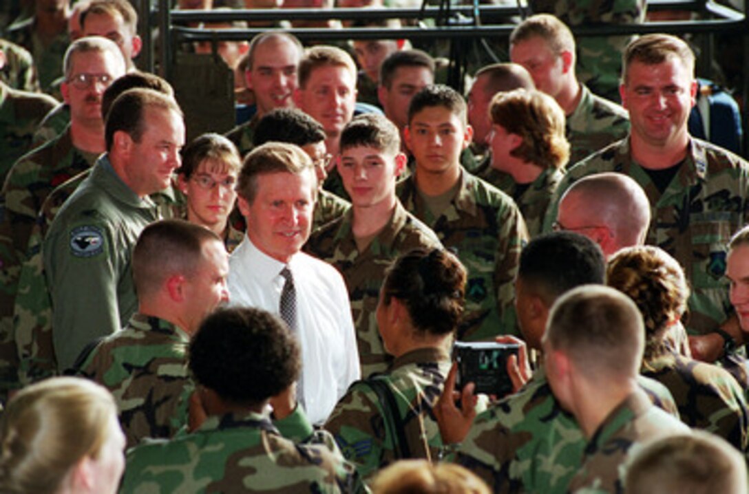 Secretary of Defense William S. Cohen mingles with U.S. personnel assigned to the U.S. Air Force's 8th Fighter Wing at Kunsan Air Base, Republic of Korea on Sept. 21, 2000. Cohen is on a Southeast Asia trip to meet with government and defense leaders. 