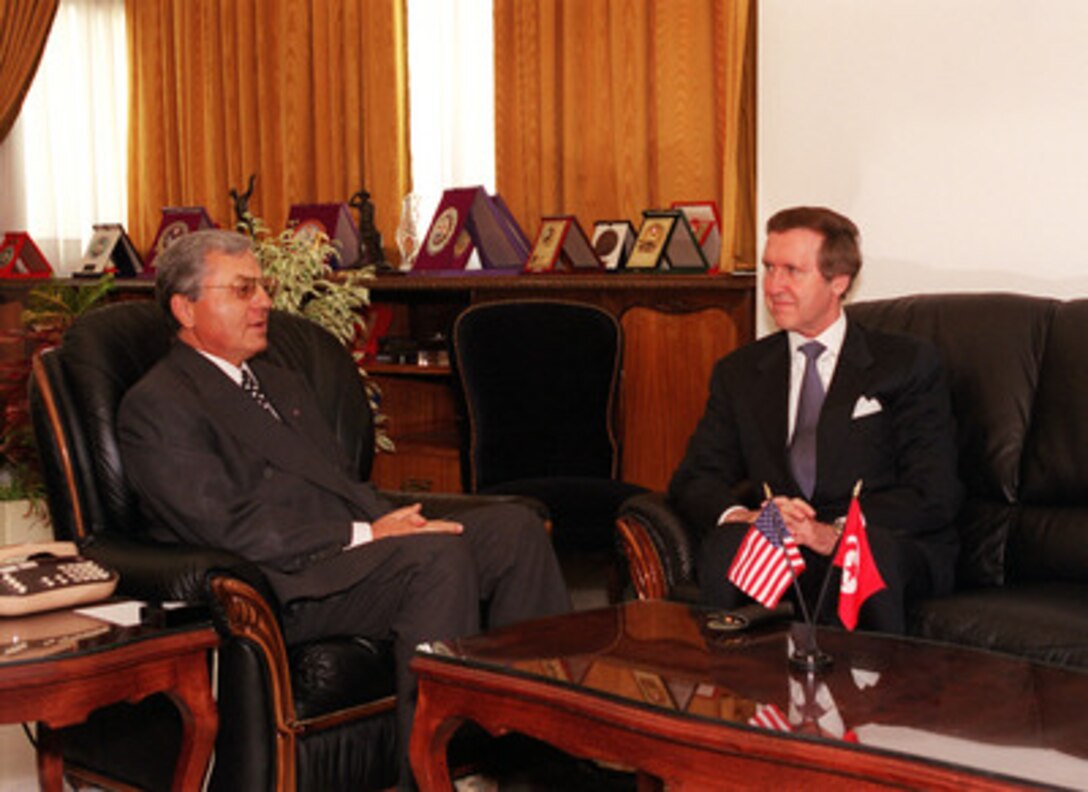 Secretary of Defense William S. Cohen (right) meets with Tunisian Minister of Defense Mohamed Jegham (left) in Tunis, Tunisia, on Oct. 7, 2000. The two defense leaders talks centered on a number of regional security issues of interest to both nations. Cohen's stop in Tunisia came at the start of a three nation visit which will also take him to Greece and the United Kingdom. 