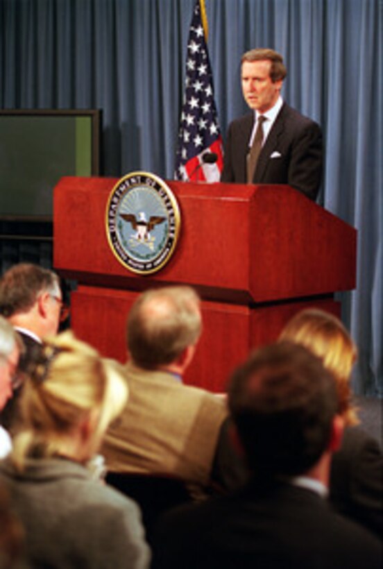 Secretary of Defense William S. Cohen briefs reporters at the Pentagon about the suspected terrorist attack on the USS Cole (DDG 67) in Aden, Yemen, on Oct. 12, 2000. Cohen reported that five sailors were confirmed dead, 36 wounded and 12 missing, though he believed those figures would change as work in the damaged ship continued. 