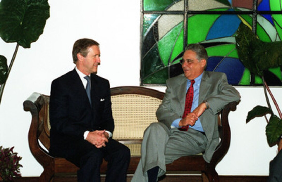 Secretary of Defense William S. Cohen (left) meets with Brazilian President Fernando Henrique Cardoso (right) in Manaus, Brazil, on Oct. 17, 2000. The two men discussed the current events in the Middle East concerning the terrorist attack on the USS Cole (DDG 67). Cohen and Cardoso are in Manaus attending the Defense Ministerial of the Americas IV. 