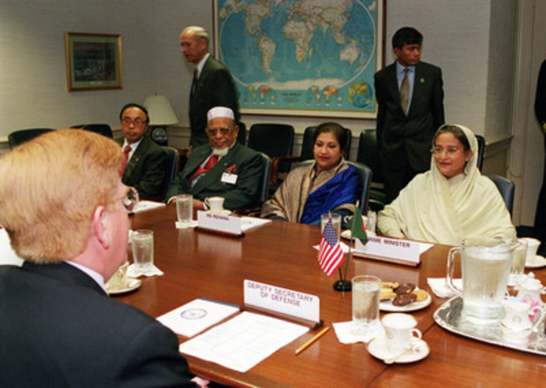 Prime Minister Sheikh Hasina (right), of the Peoples Republic of Bangladesh, meets with Deputy Secretary of Defense Rudy de Leon (left foreground) in the Pentagon on Oct. 17, 2000. Hasina, who also serves as her nation's defense minister, and de Leon are conducting talks on a broad range of security issues of interest to both nations. 