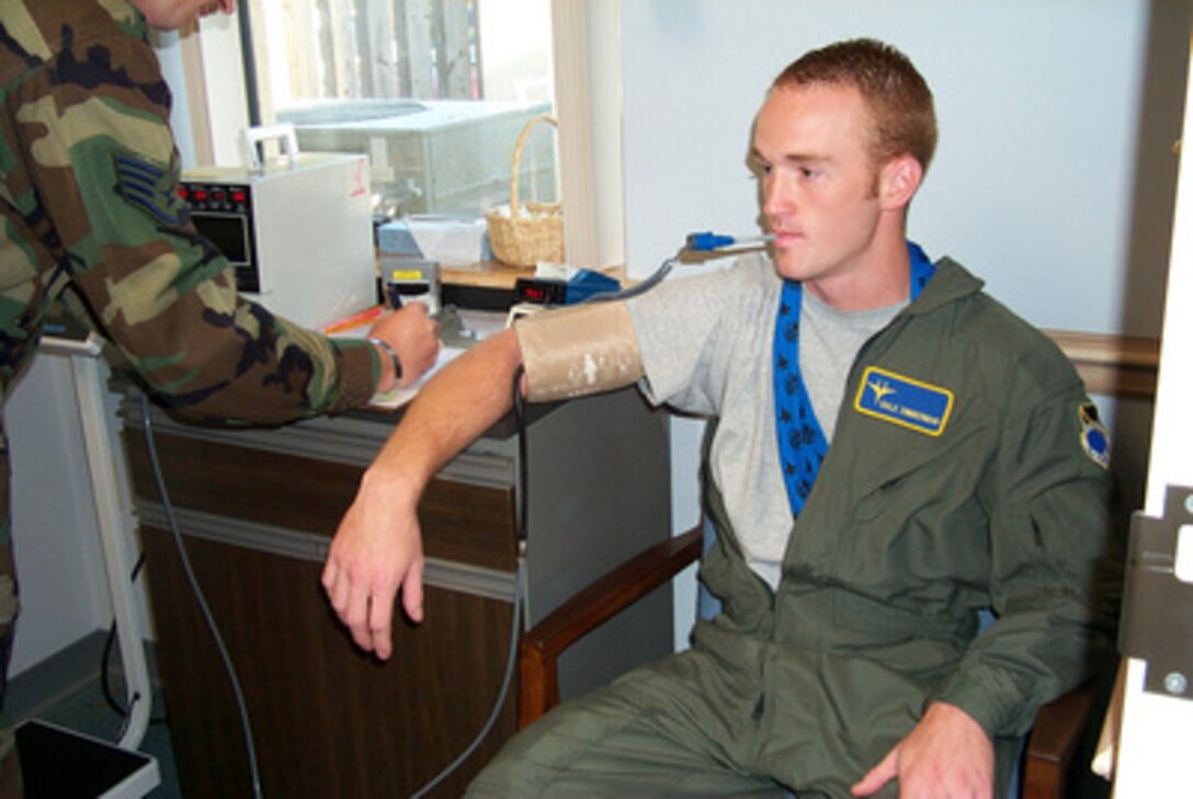 Dale Zimmerman is given a physical at Tyndall Air Force Base, Fla., prior to an orientation flight in an F-15 Eagle on Aug. 24, 2000. Zimmerman is the Air Force winner of the Yahoo! Fantasy Careers in Today's Military Contest and is spending a two-day adventure as an honorary F-15 pilot. Zimmerman, 22, from Junction City, Ore., is a customer service representative for United Airlines. 