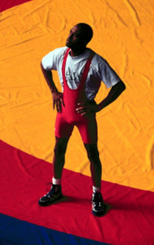 Navy Petty Officer 1st Class Steven Mays, team captain of the U.S. Olympic Greco-Roman wrestling team, pauses before a workout at the 2000 Olympic Games in Sydney, Australia, on Sept. 14, 2000. Mays will wrestle in the 54 kg/119 lb. weight class. Fifteen U.S. military athletes are competing in the 2000 Olympic games as members of the U.S. Olympic team. In addition to the 15 competing athletes there are eight alternates and five coaches representing each of the four services in various venues. Mays is a Navy aviation boatswain's mate (Launch and Recovery Equipment) attached to the aircraft carrier USS John F. Kennedy (CV 67). 