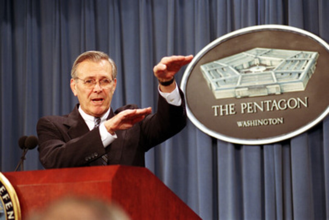 010413-D-9880W-018  Secretary of Defense Donald H. Rumsfeld briefs reporters in the Pentagon on April 13, 2001, on the facts associated with the recent collision of the EP-3 Aries II reconnaissance aircraft and a Chinese F-8 fighter aircraft. 