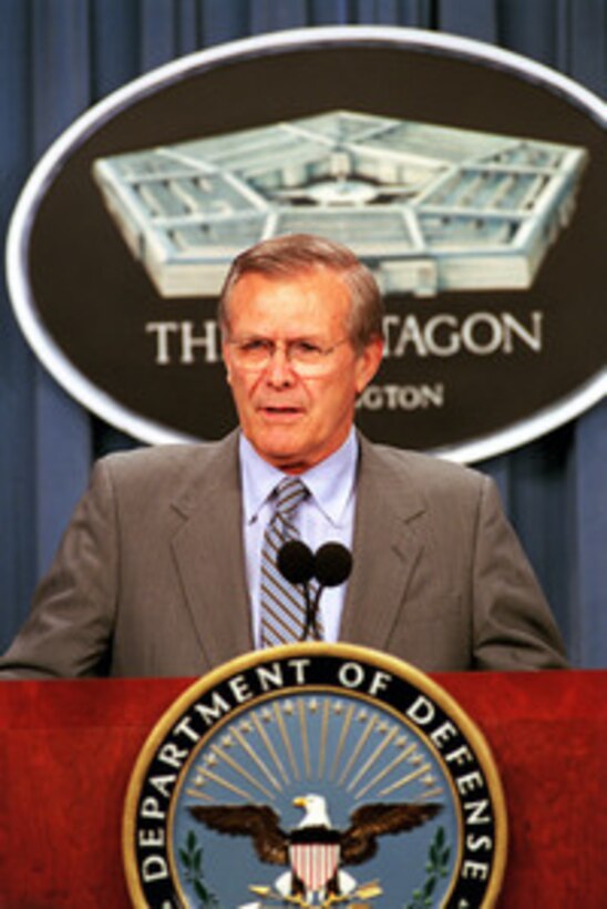 Secretary of Defense Donald H. Rumsfeld talks to reporters during a media availability in the Pentagon on Aug. 3, 2001. 