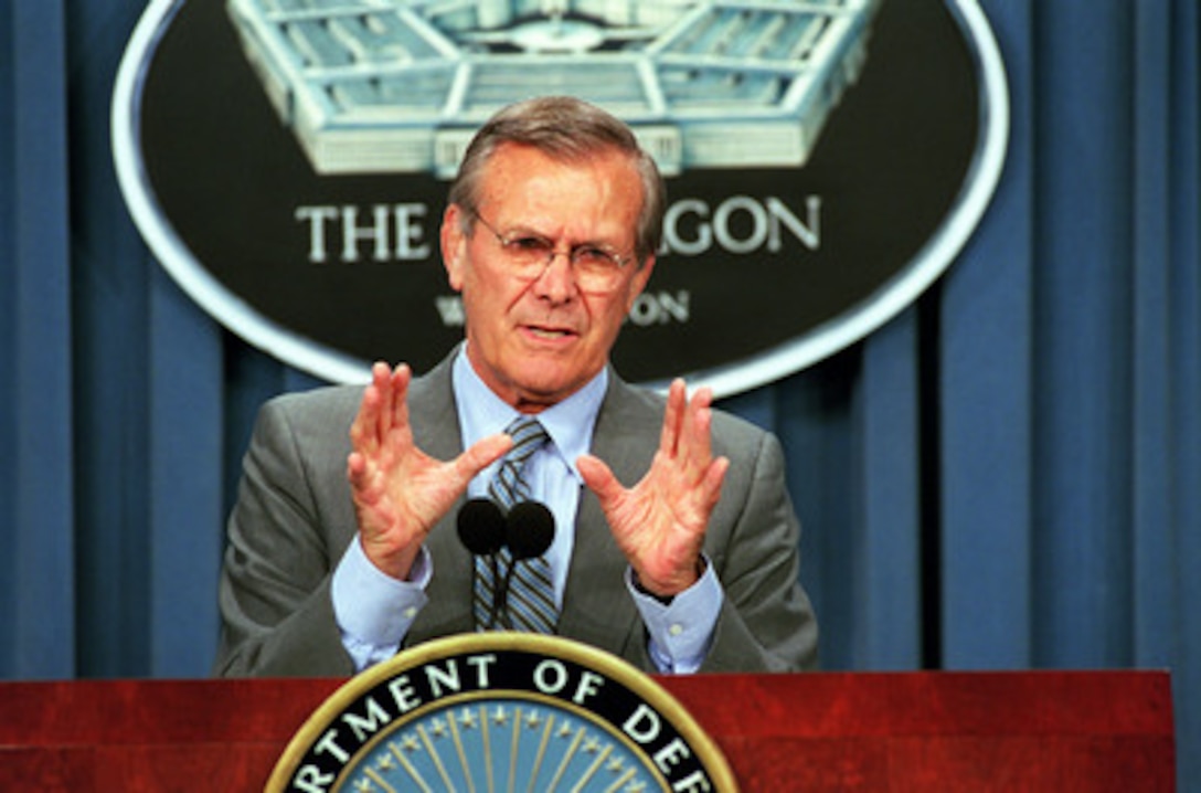 Secretary of Defense Donald H. Rumsfeld answers a reporter's question during a media availability in the Pentagon on Aug. 3, 2001. 
