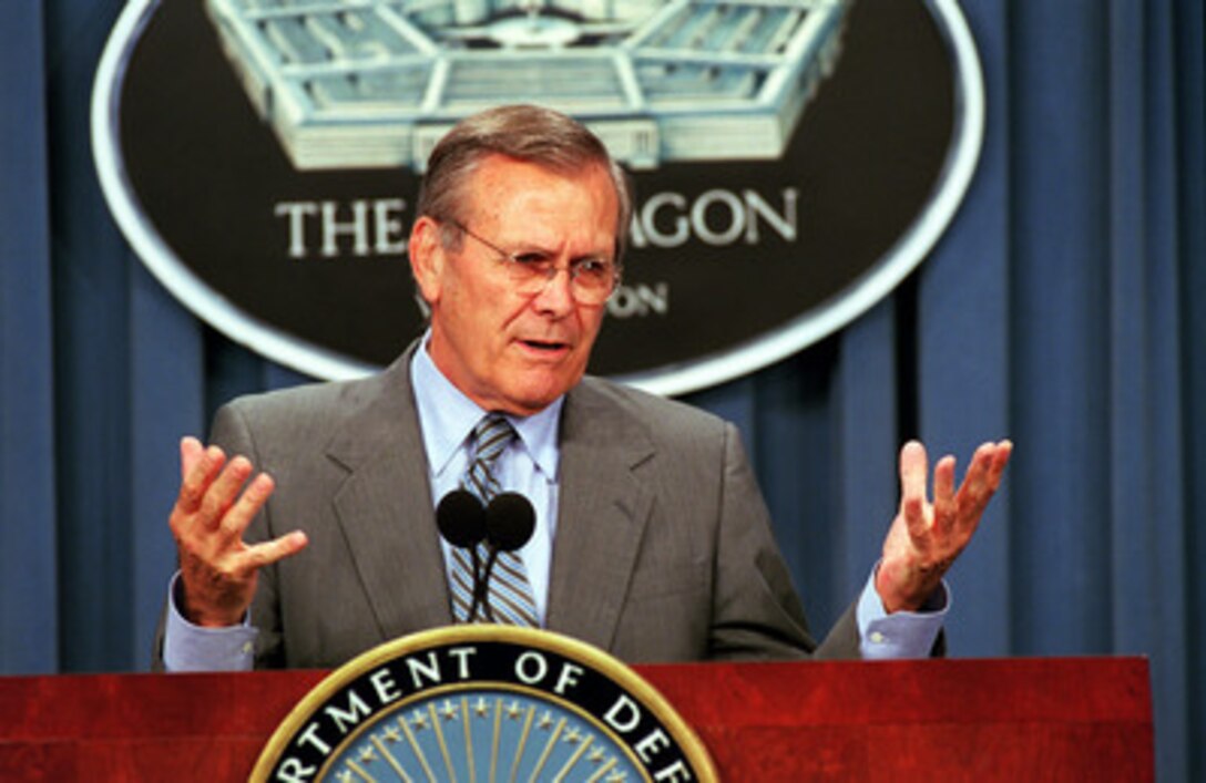 Secretary of Defense Donald H. Rumsfeld answers a reporter's question during a media availability in the Pentagon on Aug. 3, 2001. 