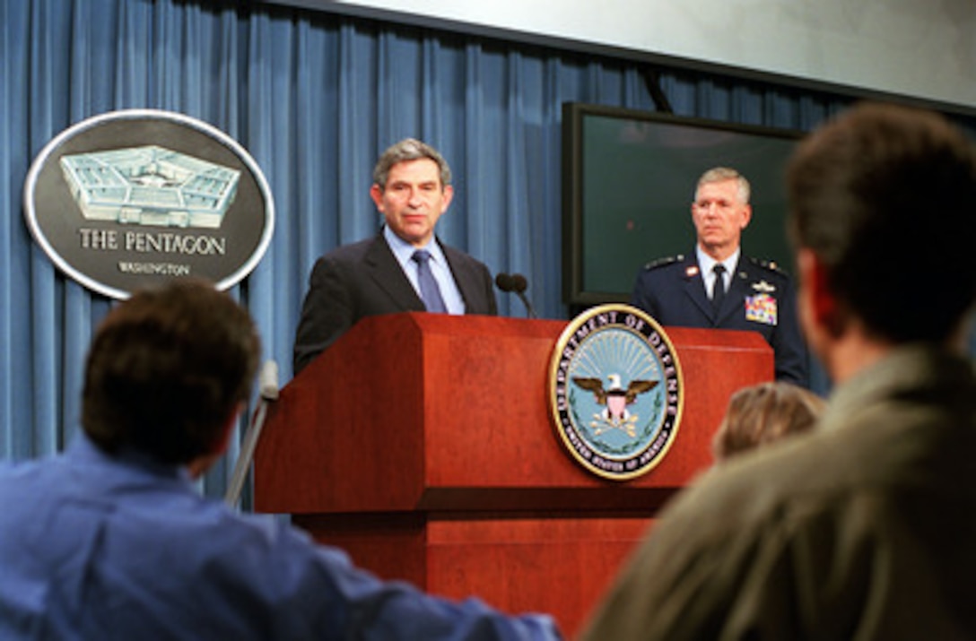 Deputy Secretary of Defense Paul Wolfowitz (left) responds to a reporter's question during his Pentagon press briefing on Defense Planning Guidance on Aug. 16, 2001. Vice Chairman of the Joint Chiefs of Staff Gen. Richard B. Myers joined Wolfowitz during the briefing. 