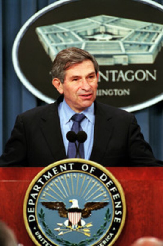 Deputy Secretary of Defense Paul Wolfowitz responds to a reporter's question during his Pentagon press briefing on Defense Planning Guidance on Aug. 16, 2001. 