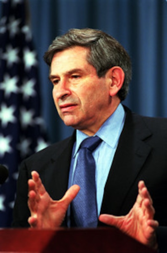 Deputy Secretary of Defense Paul Wolfowitz responds to a reporter's question during his Pentagon press briefing on Defense Planning Guidance on Aug. 16, 2001. 