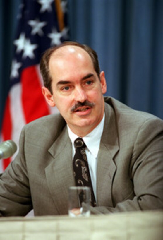 Assistant Secretary of Defense for International Security Policy J. D. Crouch answers questions from reporters during a media roundtable held at the Pentagon on Aug. 28, 2001. 