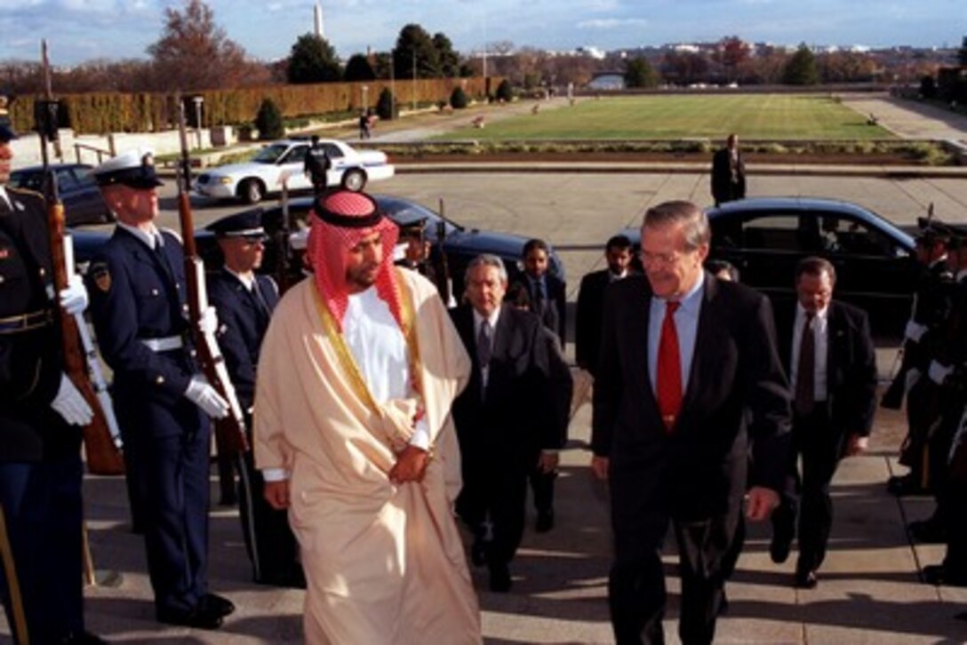 The Minister of State for Foreign Affairs of the United Arab Emirates Shaikh Hamdan bin Zayid (left) arrives at the Pentagon for a meeting with Secretary of Defense Donald H. Rumsfeld (right) on Nov. 20, 2001. The two men are expected to discuss a range of security issues of interest to both nations. 