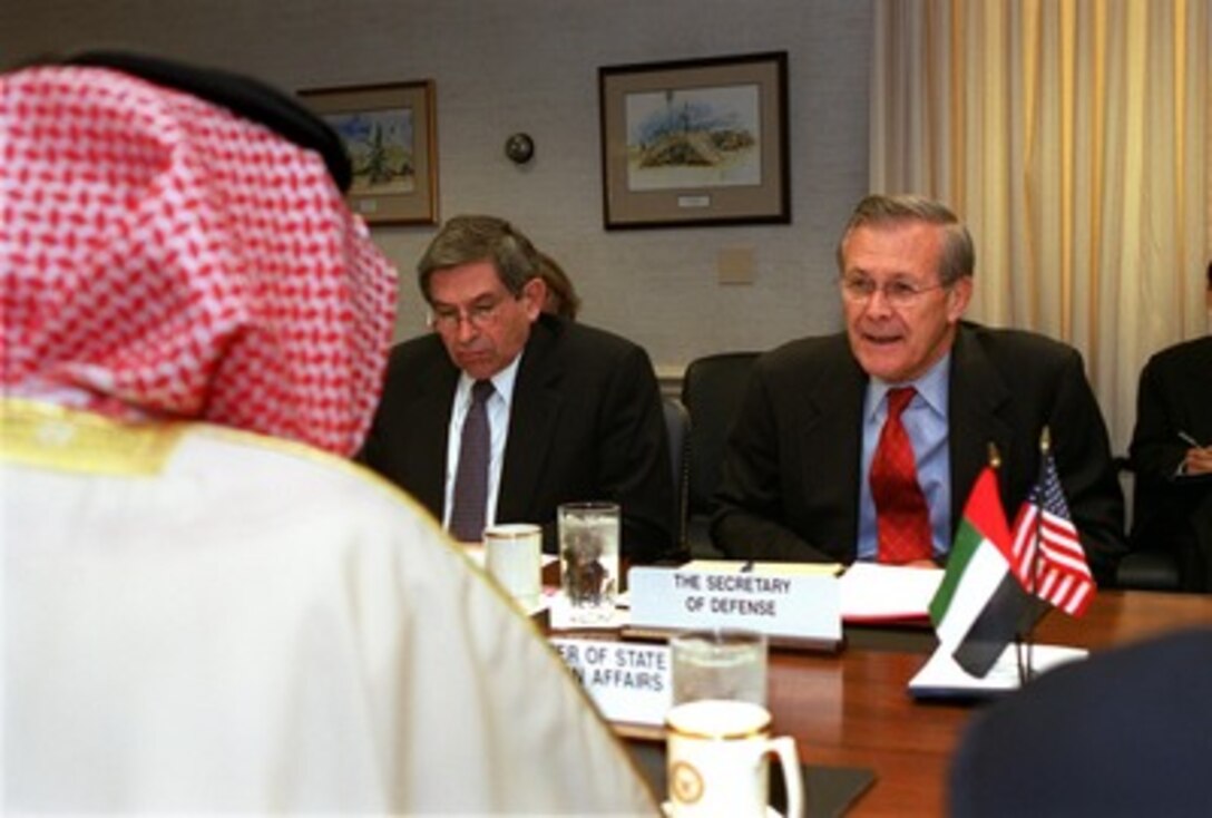 Secretary of Defense Donald H. Rumsfeld (right) meets with Minister of State for Foreign Affairs Shaikh Hamdan bin Zayid (right), of the United Arab Emirates, on Nov. 20, 2001, in the Pentagon. Under discussion were ranges of security issues of interest to both nations. Deputy Secretary of Defense Paul Wolfowitz (center) joined in the discussions. 