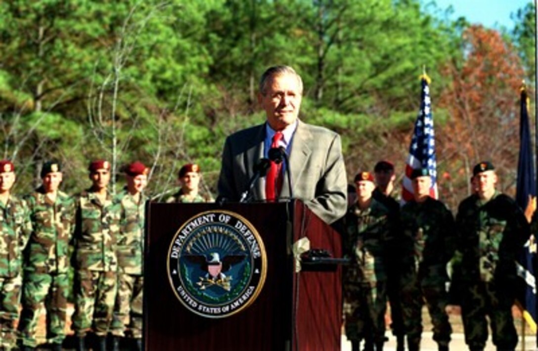 Secretary of Defense Donald H. Rumsfeld addresses members of the Special Forces Command community at Fort Bragg, N.C., on Nov. 21, 2001. Rumsfeld is visiting Fort Bragg and Pope Air Force Base to receive briefings and demonstrations on the capabilities of U.S. Special Forces made up of Army Rangers and Special Forces, Navy SEAL teams and Air Force Combat Control Teams. 
