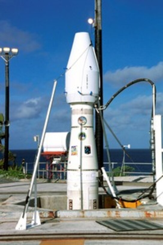 A payload launch vehicle carrying a prototype exoatmospheric kill vehicle is readied for launch from Meck Island at the Kwajalein Missile Range on Dec. 3, 2001, for a planned intercept of a ballistic missile target over the central Pacific Ocean. The target vehicle, a modified Minuteman intercontinental ballistic missile, will be launched from Vandenberg Air Force Base, Calif. The interceptor is planned to hit the target more than 140 miles above the Earth during the midcourse phase of the warhead's flight. 