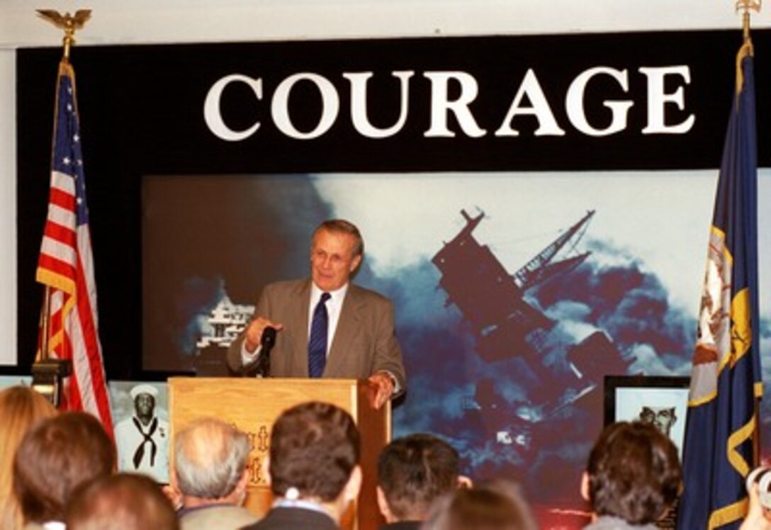 Secretary of Defense Donald H. Rumsfeld holds a press conference at the Naval Training Center Great Lakes, Great Lakes, Ill, on Nov. 16, 2001. Rumsfeld was the guest of honor and reviewing officer at the graduation ceremony for naval personnel completing their basic training at Great Lakes. 