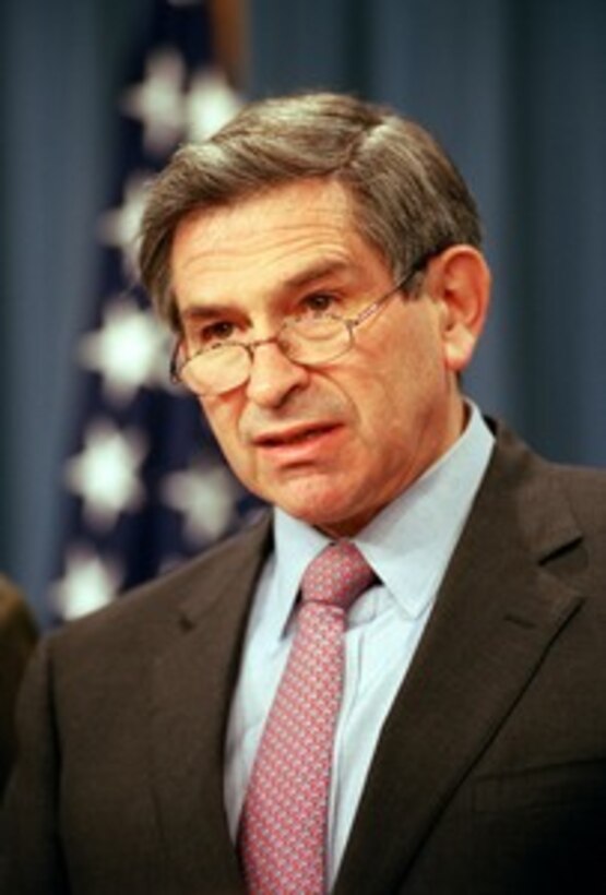 Deputy Secretary of Defense Paul Wolfowitz briefs reporters at the Pentagon about the on-going campaign against the al Qaeda terrorist organization and the military capability of Taliban regime in Afghanistan on Nov. 21, 2001. 