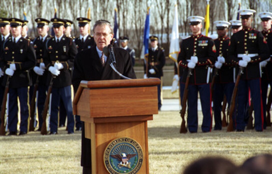 Secretary of Defense Donald H. Rumsfeld addresses the audience at an Armed Forces Full Honor Welcoming Ceremony and Review in his honor on the Pentagon parade field on Jan. 26, 2001. Rumsfeld was sworn in as the 21st secretary of Defense in a ceremony at the White House Oval Office earlier today. 