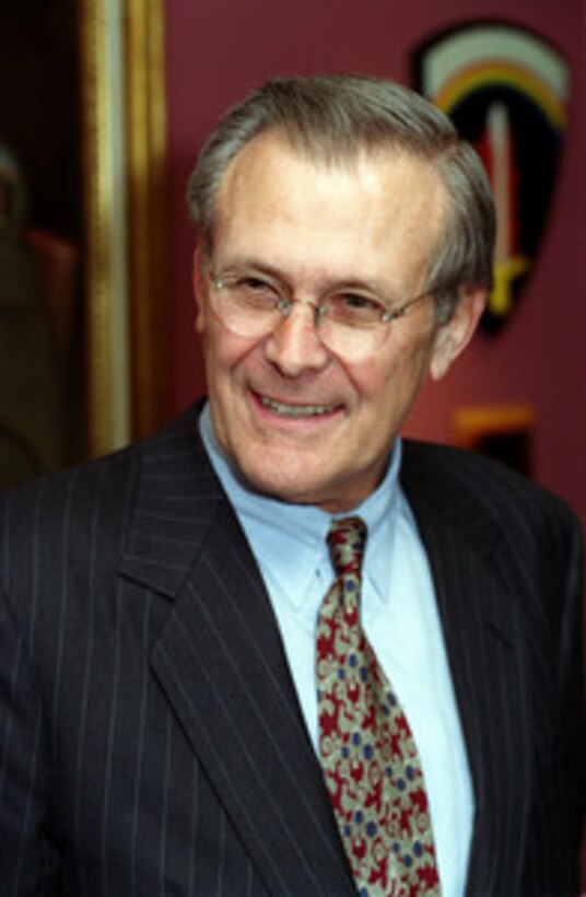 Secretary of Defense Donald H. Rumsfeld prepares to greet guests at a reception in the Eisenhower Corridor following the welcoming ceremony in his honor at the Pentagon on Jan. 26, 2001. Rumsfeld was sworn in as the 21st secretary of Defense in a ceremony at the White House Oval Office earlier today. 