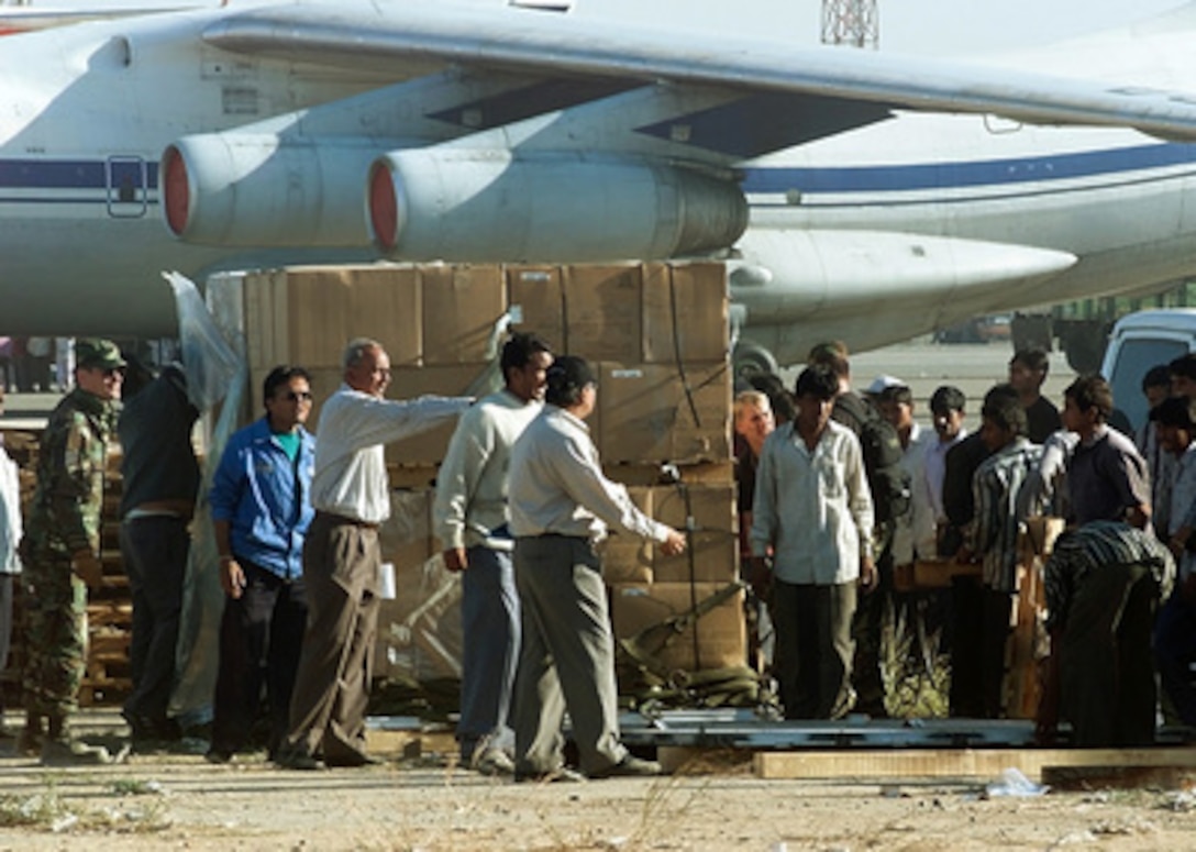 Pallets of humanitarian relief supplies from the U.S. are unloaded at Ahmadabad, India, on Feb. 3, 2001. Tons of the much needed supply of blankets, tents, sleeping bags, and heavy equipment are being transported to Ahmadabad aboard U.S. Air Force C-17 Globemaster III transport aircraft from Andersen Air Force Base, Guam, to aid victims of the January 26th earthquake. 