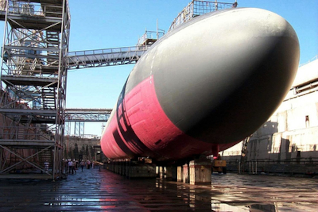 The USS Greeneville (SSN 772) sits atop blocks in Dry Dock #1 at the Pearl Harbor Naval Shipyard and Intermediate Maintenance Facility, Pearl Harbor, Hawaii, on Feb. 21, 2001. The Los Angeles class attack submarine is dry-docked to assess the damage and perform necessary repairs following a Feb. 9 collision at sea with the Japanese fishing vessel Ehime Maru off the coast of Honolulu, Hawaii. 