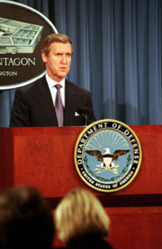 Secretary of Defense William S. Cohen briefs reporters in the Pentagon on Jan. 11, 2001, about the Statement of Mutual Understanding between the U.S. and the Republic of Korea concerning the No Gun Ri incident during the Korean War. 