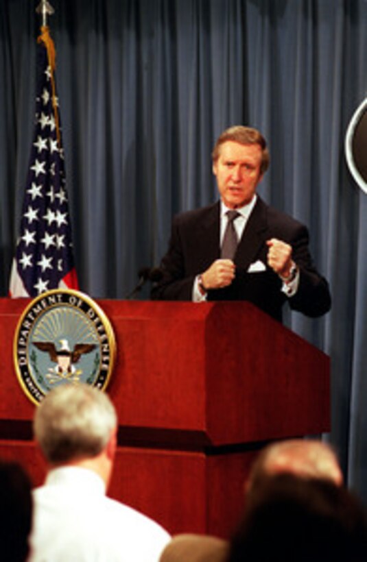 Secretary of Defense William S. Cohen announces the release of the unclassified version of the report of the USS Cole Commission at a Pentagon press conference on Jan. 9, 2001. Cohen told reporters that he had turned the classified report over to Chairman of the Joint Chief of Staff Gen. Henry Shelton, U.S. Army, for his advice concerning implementation of the report's recommendations and any other additional actions the Department of Defense should take. The USS Cole (DDG 67) was the target of a terrorist attack in the port of Aden, Yemen, on Oct. 12, 2000, during a scheduled refueling. The attack killed 17 crew members and injured 39 others. 