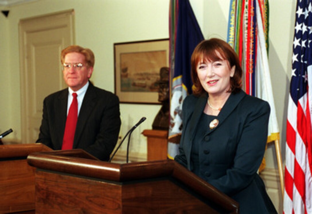 Minister of State For Defence Procurement Baroness Symons (right), of the United Kingdom, answers a reporter's question during a press conference with Deputy Secretary of Defense Rudy de Leon in the Pentagon on Jan. 17, 2001. Symons and de Leon earlier signed a memorandum of understanding on the next phase of the Joint Strike Fighter program. The Baroness committed her government to an additional $2 billion funding for the development of the multi-mission aircraft. 
