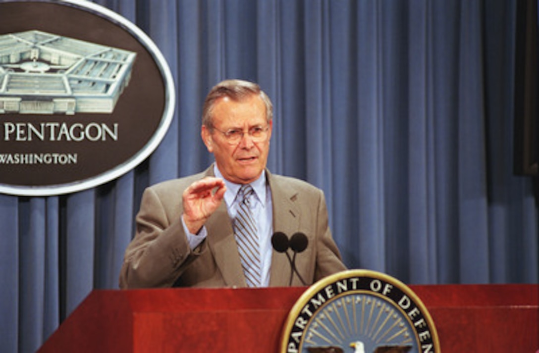 Secretary of Defense Donald H. Rumsfeld emphasizes a point while answering a question during a briefing by Under Secretary of Defense (Comptroller) Dov Zakheim on the Bush Administration's amended fiscal 2002 budget request for the Department of Defense June 27, 2001. 