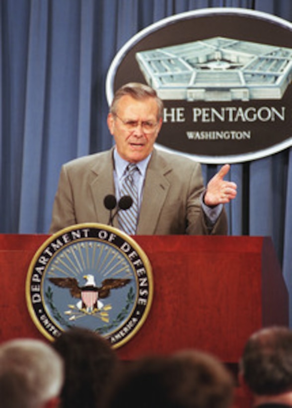 Secretary of Defense Donald H. Rumsfeld opens the Pentagon briefing by Under Secretary of Defense (Comptroller) Dov Zakheim on the Bush Administration's amended fiscal 2002 budget request for the Department of Defense June 27, 2001. 