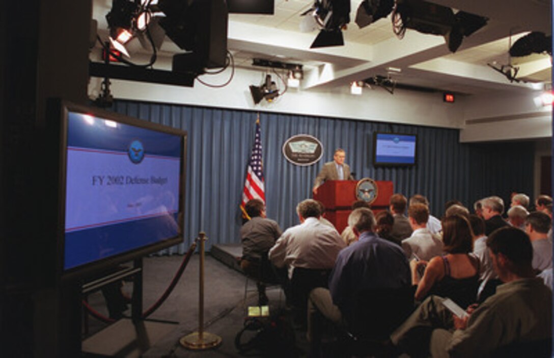 Secretary of Defense Donald H. Rumsfeld begins his section of a briefing by Under Secretary of Defense (Comptroller) Dov Zakheim on the Bush Administration's amended fiscal 2002 budget request for the Department of Defense June 27, 2001. 