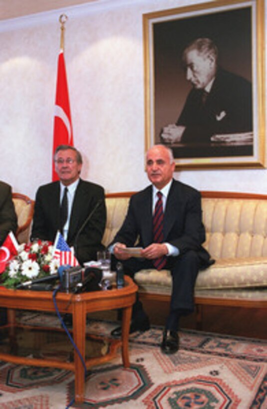 Secretary of Defense Donald H. Rumsfeld (left) and Turkish Minister of Defense Sabahattin Cakmakoglu hold a media availability at the conclusion of their meetings in Ankara, Turkey, June 4, 2001. The two defense leaders discussed a range of regional security issues of interest to both nations. 