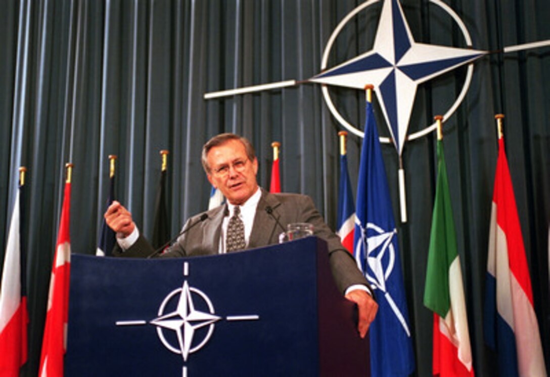 Secretary of Defense Donald H. Rumsfeld holds a press conference in the Luns Theater at NATO Headquarters in Brussels, Belgium, on June 7, 2001. Rumsfeld is holding the press conference at the close of the first day of the NATO Defense Ministerial. The NATO meeting is one stop of Rumsfeld's seven-day, seven-nation, European tour. 