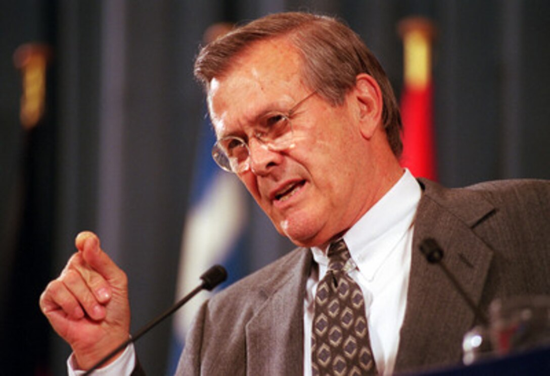 Secretary of Defense Donald H. Rumsfeld responds to a question about ballistic missile defense during a press conference in the Luns Theater at NATO Headquarters in Brussels, Belgium, on June 7, 2001. Rumsfeld is holding the press conference at the close of the first day of the NATO Defense Ministerial. The NATO meeting is one stop of Rumsfeld's seven-day, seven-nation, European tour. 