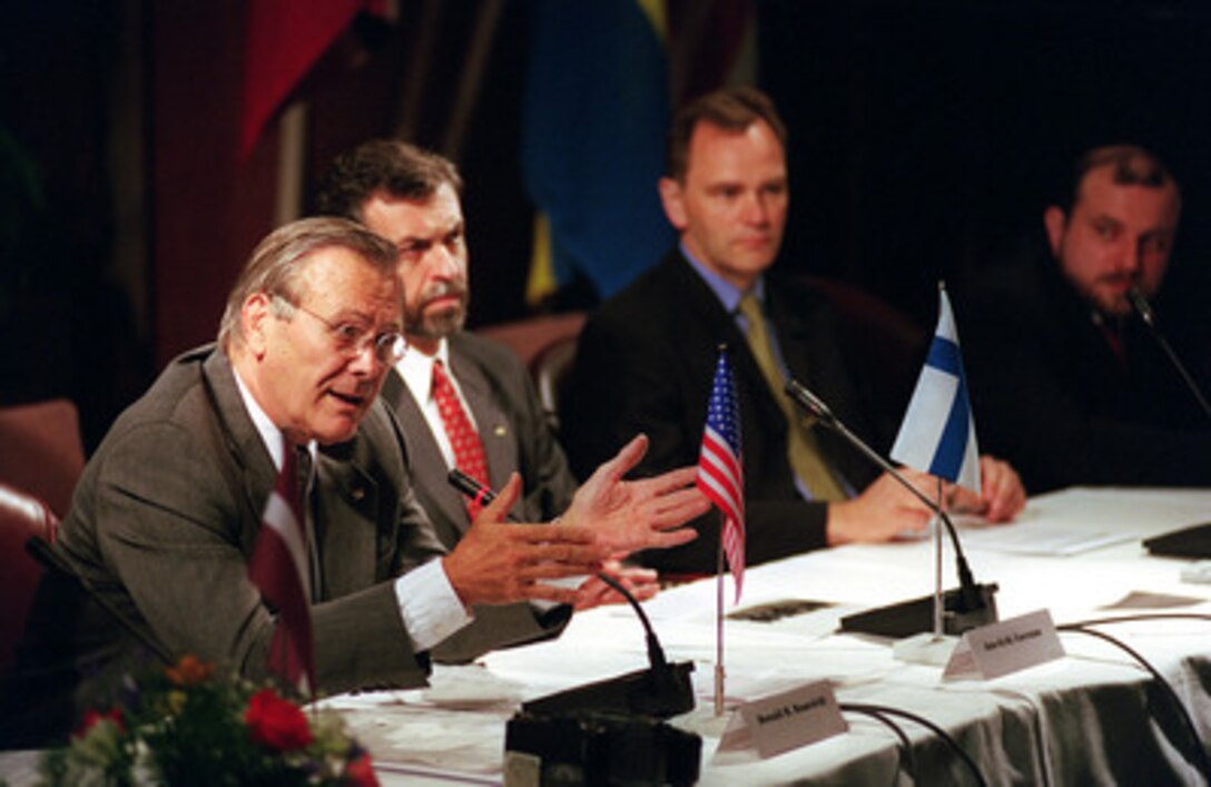Secretary of Defense Donald H. Rumsfeld (left) explains his position on a ballistic missile defense system during the annual Nordic, Baltic, U.S. Defense Ministerial held this year in Torku, Finland, on June 9, 2001. Rumsfeld was joined at the table by Finnish Minister of Defense Jan-Erik Enestam, Minister of Defense Jan Troborg of Denmark, and Minister of Defense Juri Luik, of Estonia. 