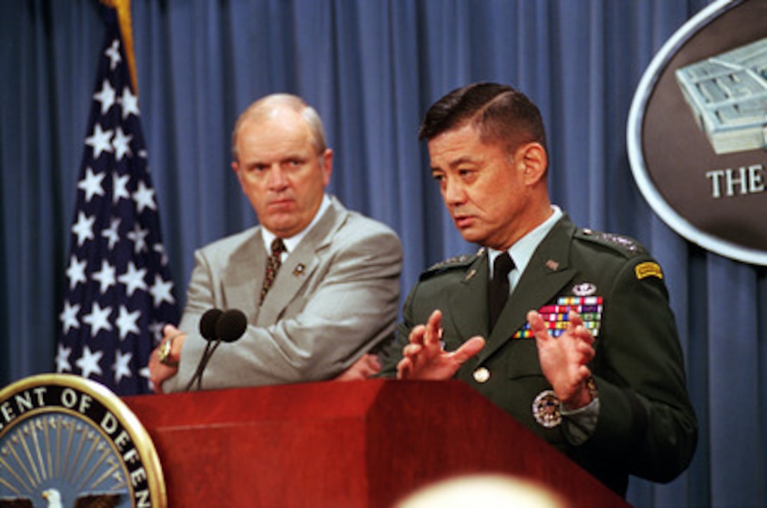 Army Chief of Staff, Gen. Eric K. Shinseki (right) joined Secretary of the Army Thomas E. White (left) in the Pentagon briefing room, on July 12, 2001, to announce the Army installations that have been selected to host the next four Interim Brigade Combat Teams. The Teams will be quickly deployable, by air or sea, and based at installations which were selected to put the forces in close geographic proximity to Air Force and Navy transport assets. 