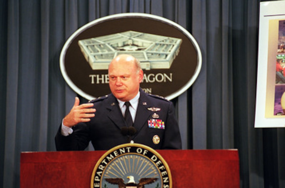 Lt. Gen. Ronald T. Kadish, director of the Ballistic Missile Defense Organization, briefs reporters in the Pentagon on July 15, 2001, on the success of Integrated Flight Test 6, which involved a planned intercept of an intercontinental ballistic missile target. The intercept took place approximately 10 minutes after the interceptor was launched, at an altitude in excess of 140 miles above the earth, and during the midcourse phase of the target warhead's flight. 