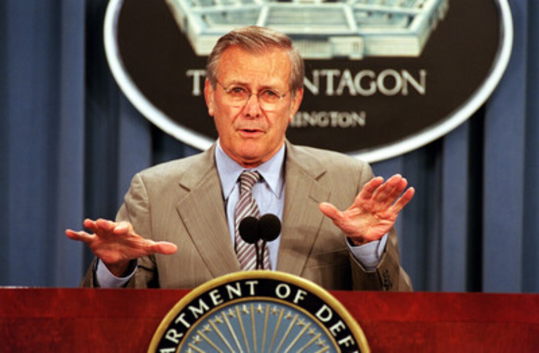 Secretary of Defense Donald H. Rumsfeld responds to a reporter's question regarding the Quadrennial Defense Review during a media availability at the Pentagon on July 18, 2001. 