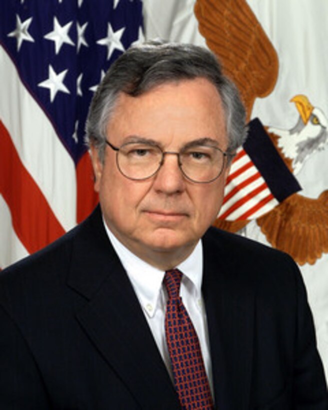 Assistant Secretary of Defense (Legislative Affairs) Powell A. Moore. 