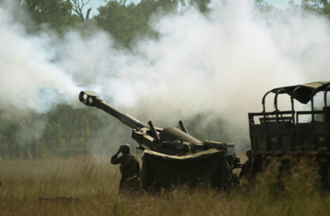 Marines perform a live fire exercise with the M-198 155 mm howitzer in the Shoalwater Bay Training Area, Queensland, Australia during Exercise Tandem Thrust 2001 on May 26, 2001. Tandem Thrust is a combined military training exercise involving more than 18,000 U.S., Australian, and Canadian personnel who are training in crisis action planning and execution of contingency response operations. The Marines are from the 1st Battalion, 12th Marines, deployed from Kaneohe Bay, Hawaii. 